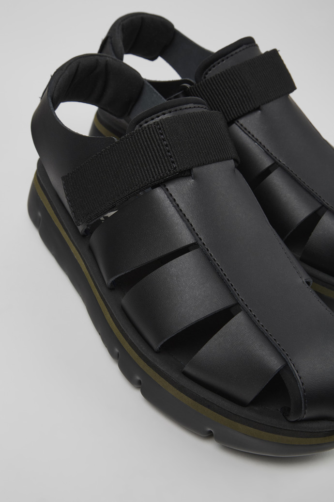 Close-up view of Oruga Black Leather/Textile Sandal for Men