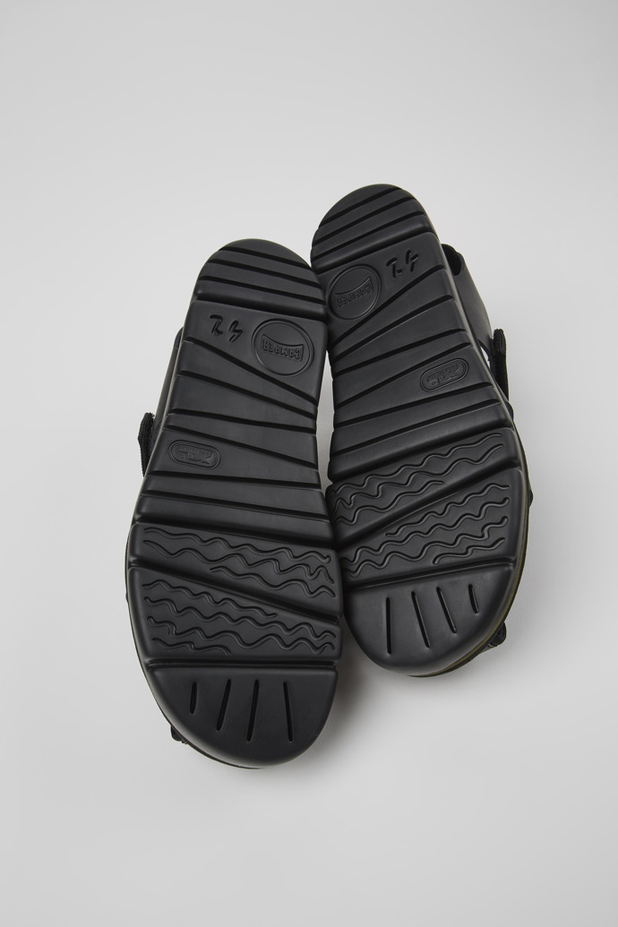 The soles of Oruga Black Leather/Textile Sandal for Men
