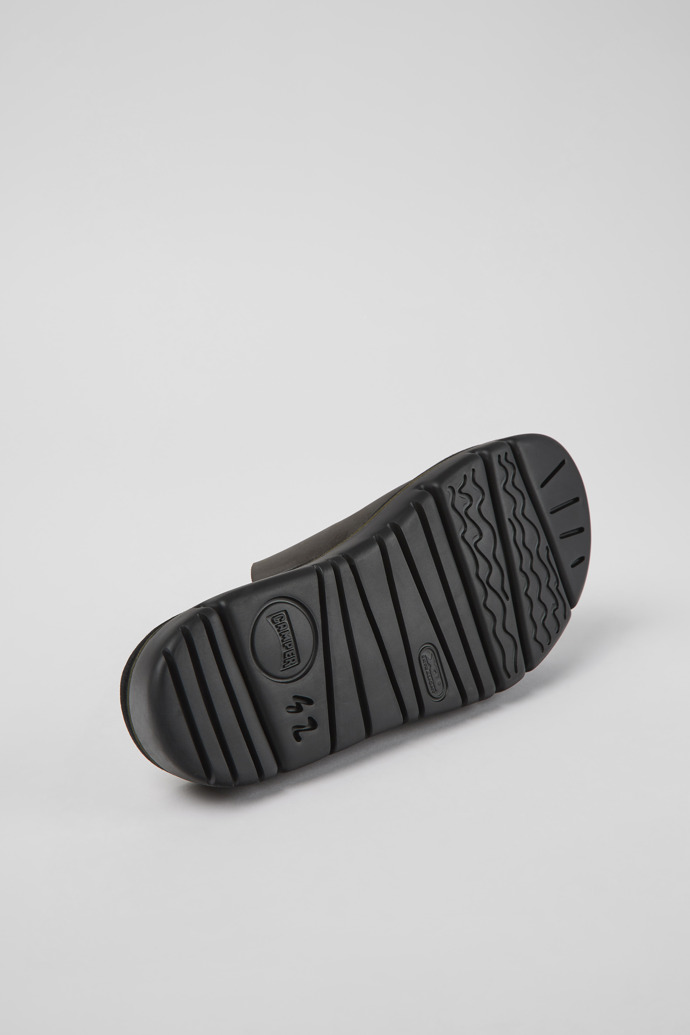 The soles of Oruga Brown Leather Slide for Men
