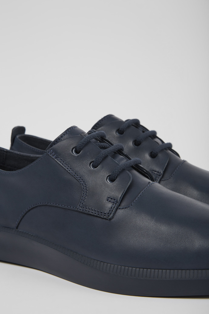Close-up view of Bill Blue leather and nubuck sneakers