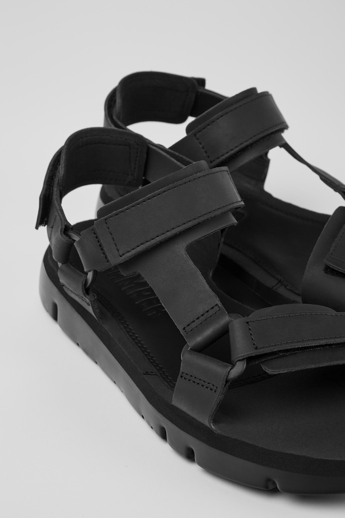Close-up view of Oruga Black leather sandals for men