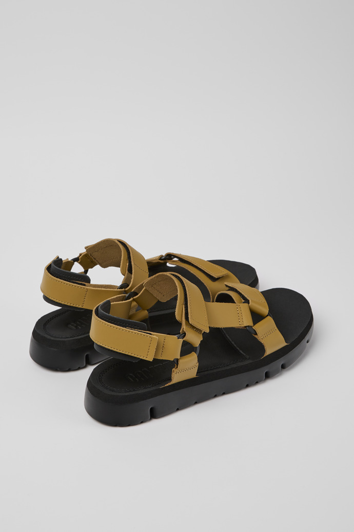 Back view of Oruga Brown leather sandals for men