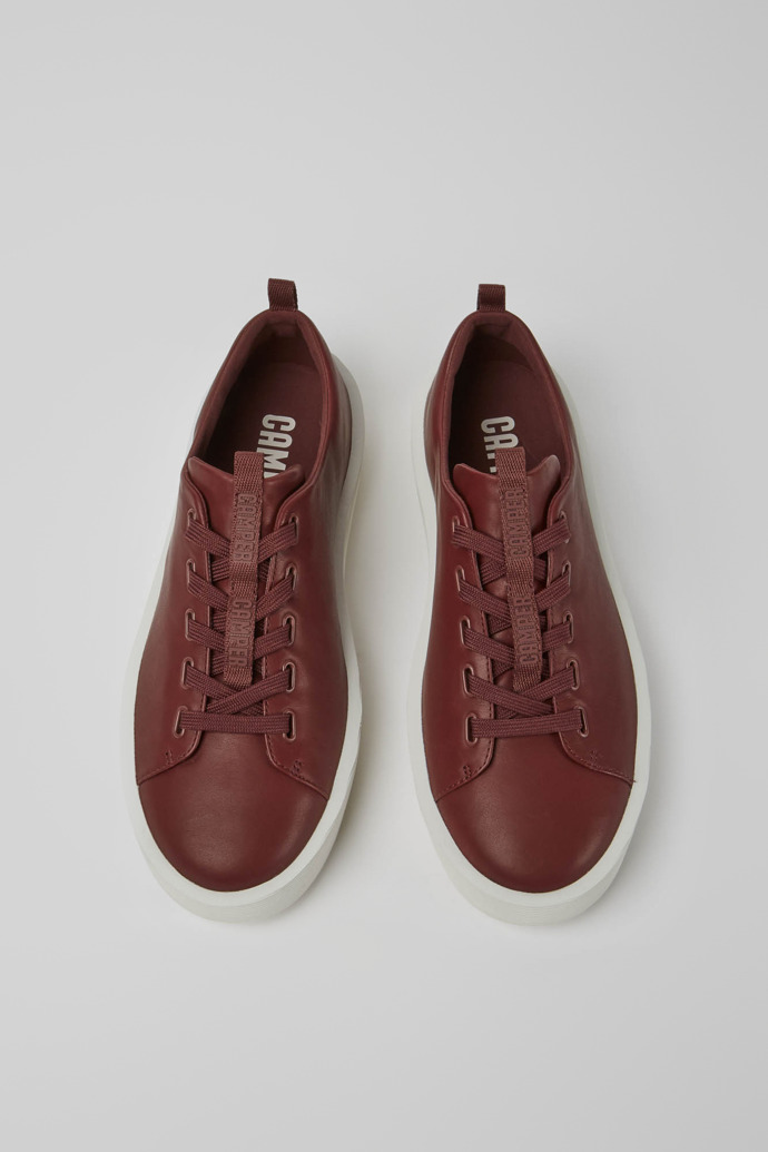 Overhead view of Courb Burgundy leather sneakers for men