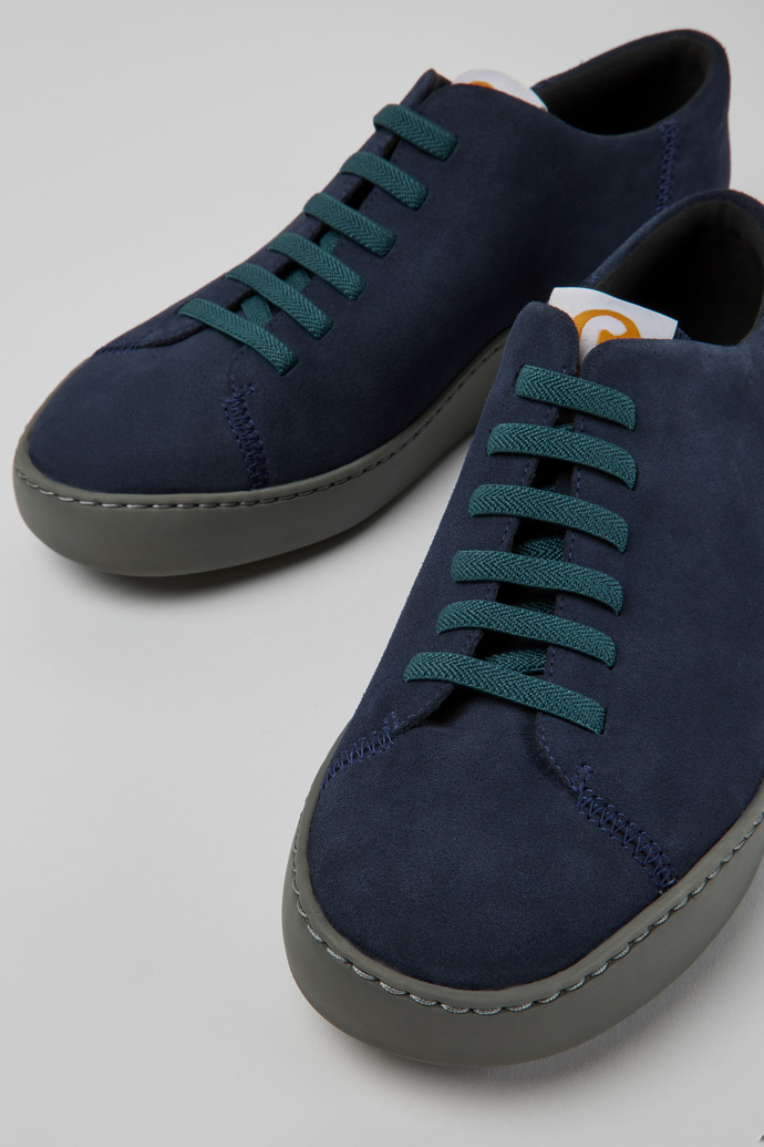 Close-up view of Peu Touring Blue suede men's sneakers
