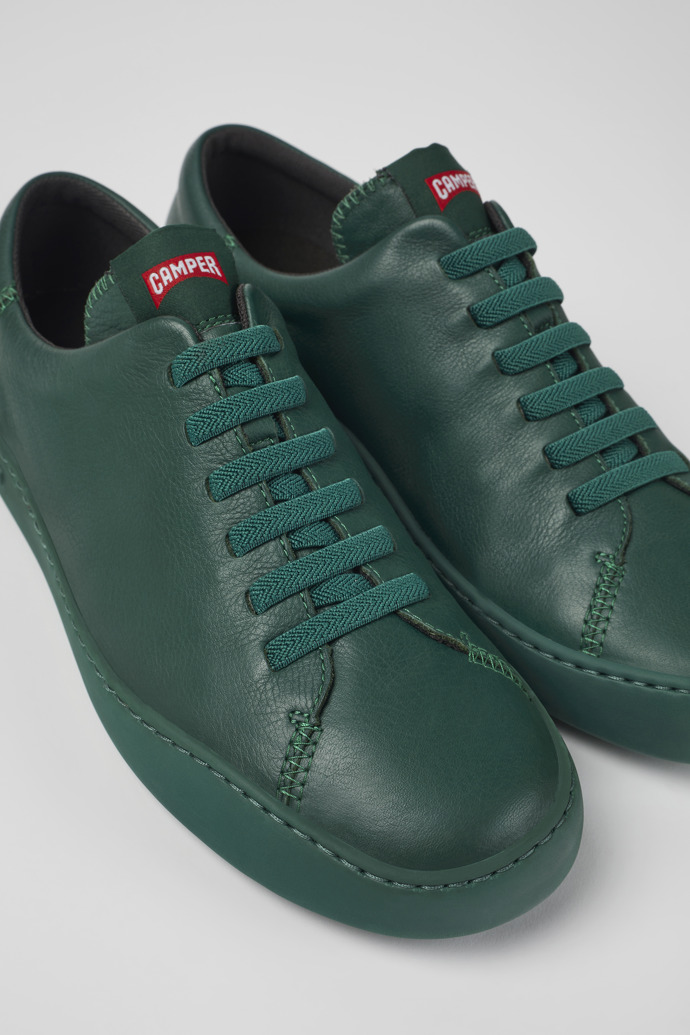 Close-up view of Peu Touring Green leather sneakers for men