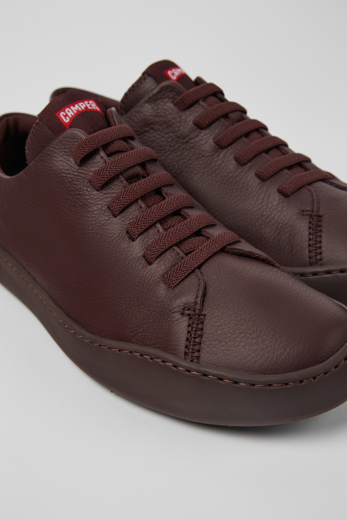 Close-up view of Peu Touring Burgundy leather sneakers for men