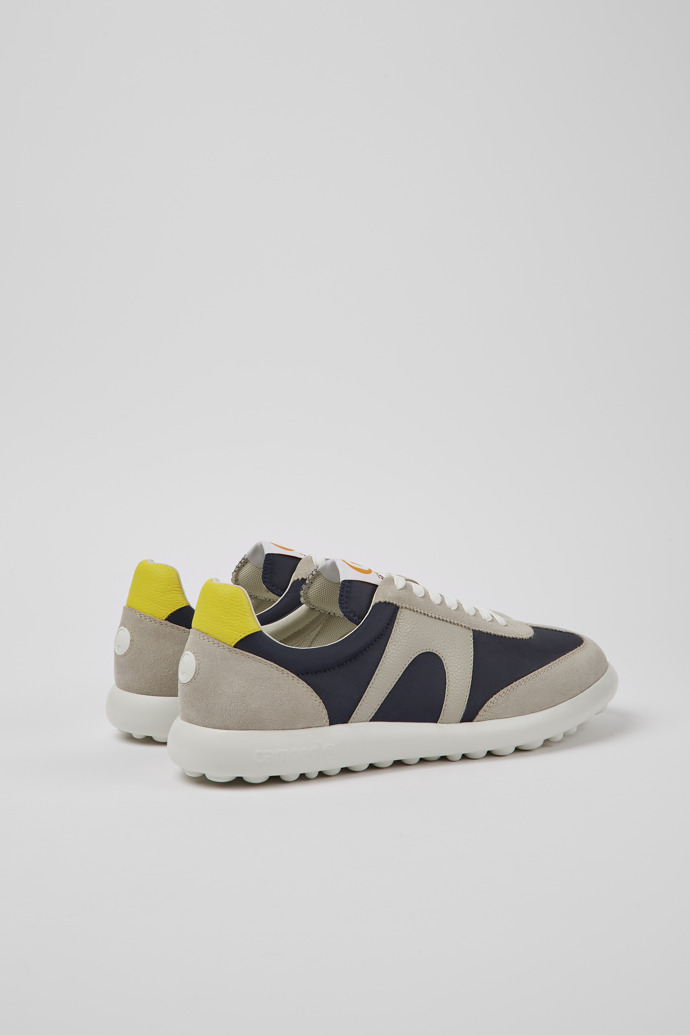Back view of Pelotas XLite Blue, grey, and yellow sneakers for men