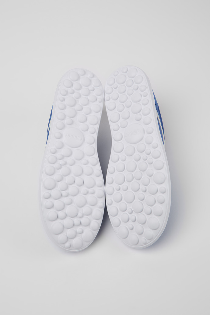 The soles of Pelotas XLite Blue and white sneakers for men