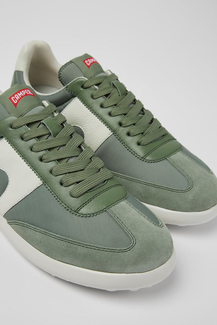 Close-up view of Pelotas XLite Green textile and leather sneakers for men