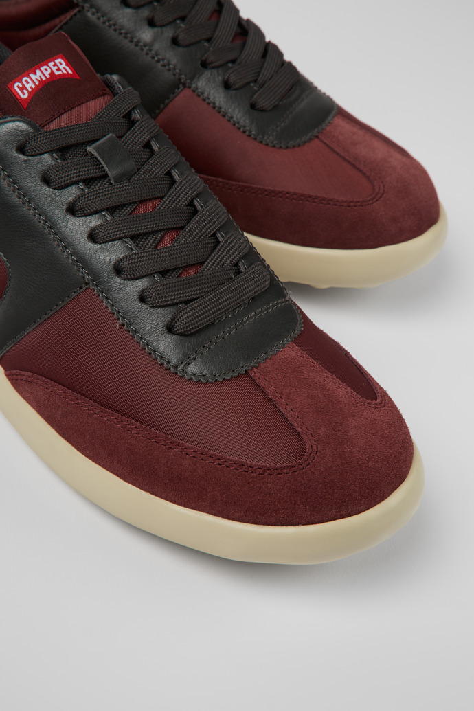 Close-up view of Pelotas XLite Burgundy textile and leather sneakers for men