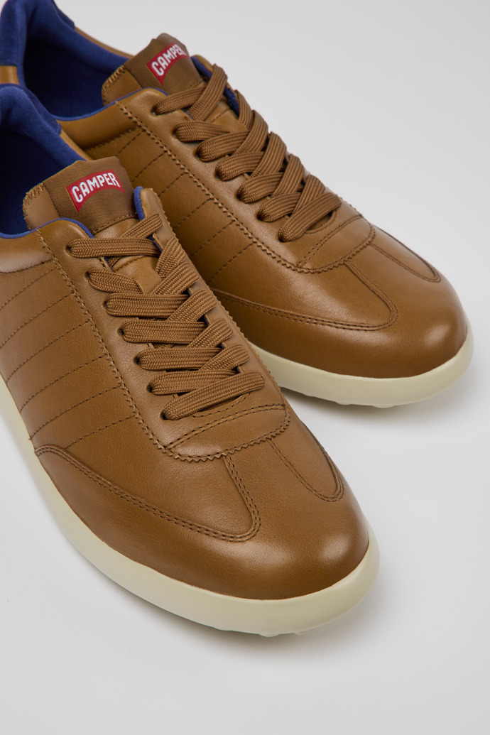 Close-up view of Pelotas XLite Brown and blue sneakers for men