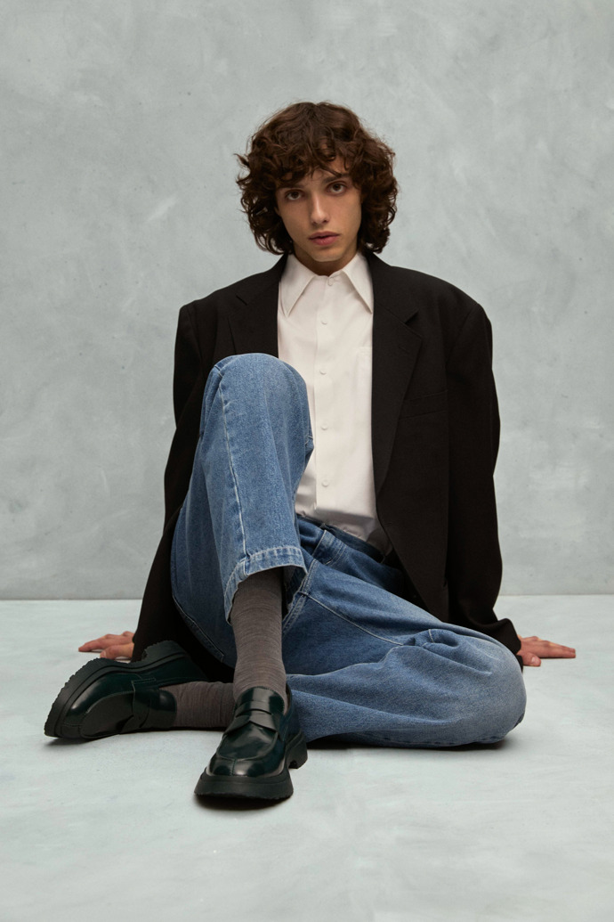 A model wearing Walden Green leather loafers for men