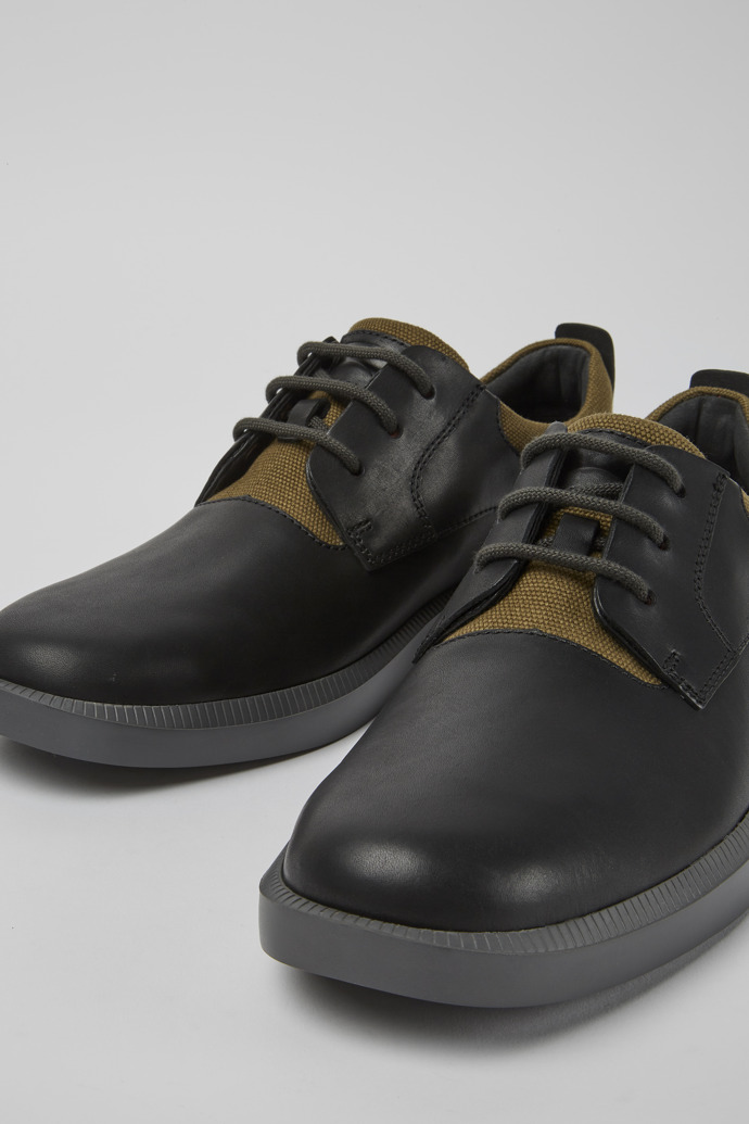 Close-up view of Bill Black leather lace up shoes