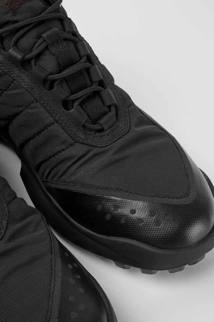 Close-up view of CRCLR Breathable men's black recycled PET sneakers
