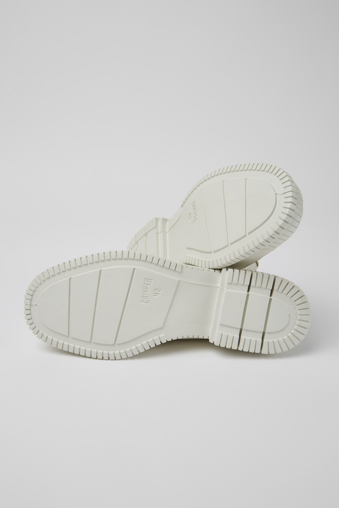 The soles of Pix White leather shoes