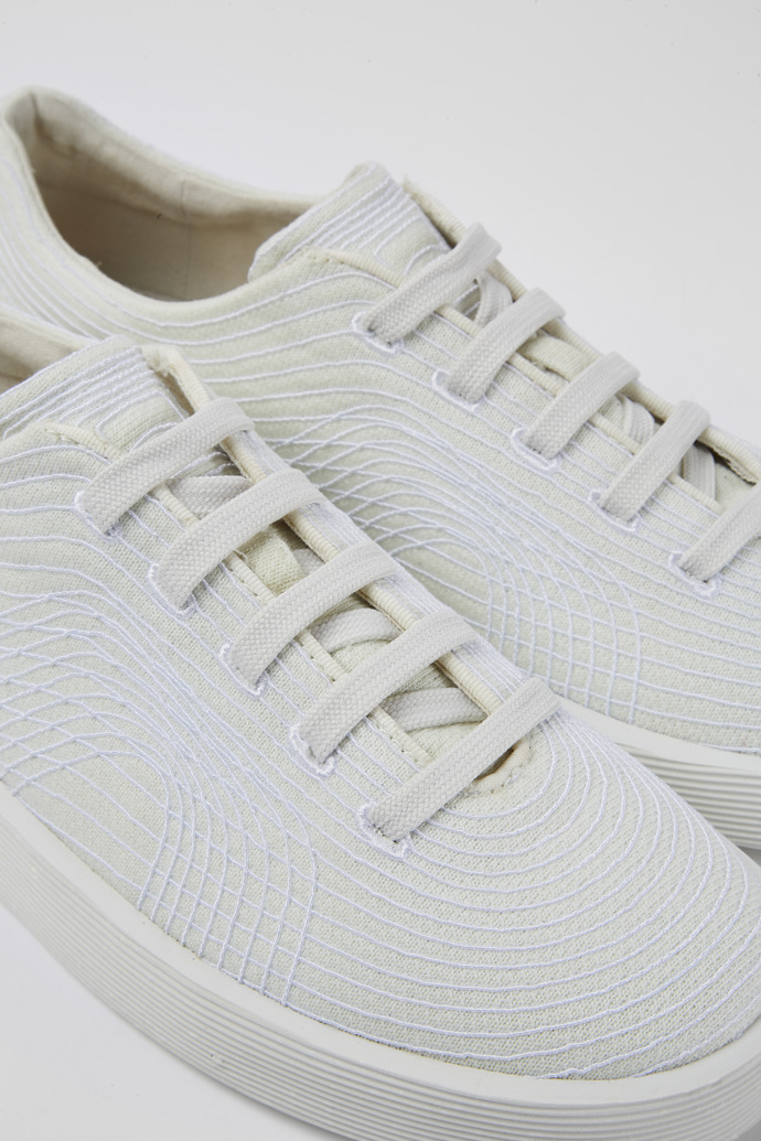 Close-up view of Courb White sneakers for men