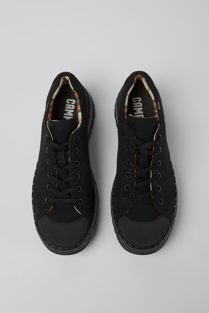 Overhead view of Teix Black rubber and BCI cotton shoe