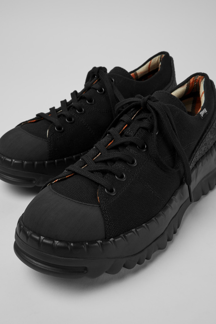 Close-up view of Teix Black rubber and BCI cotton shoe