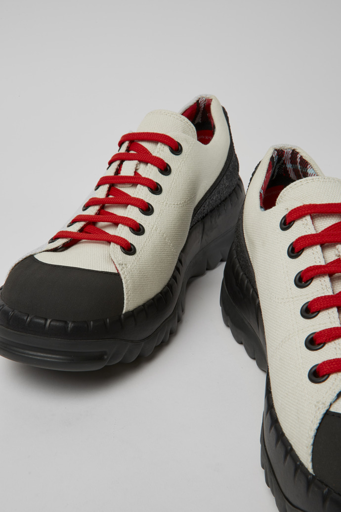 Close-up view of Teix White rubber and BCI cotton shoes