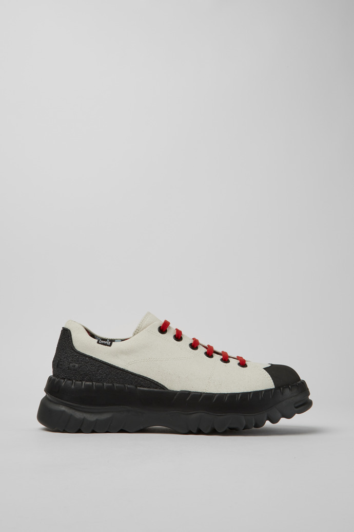 Side view of Teix White rubber and BCI cotton shoes