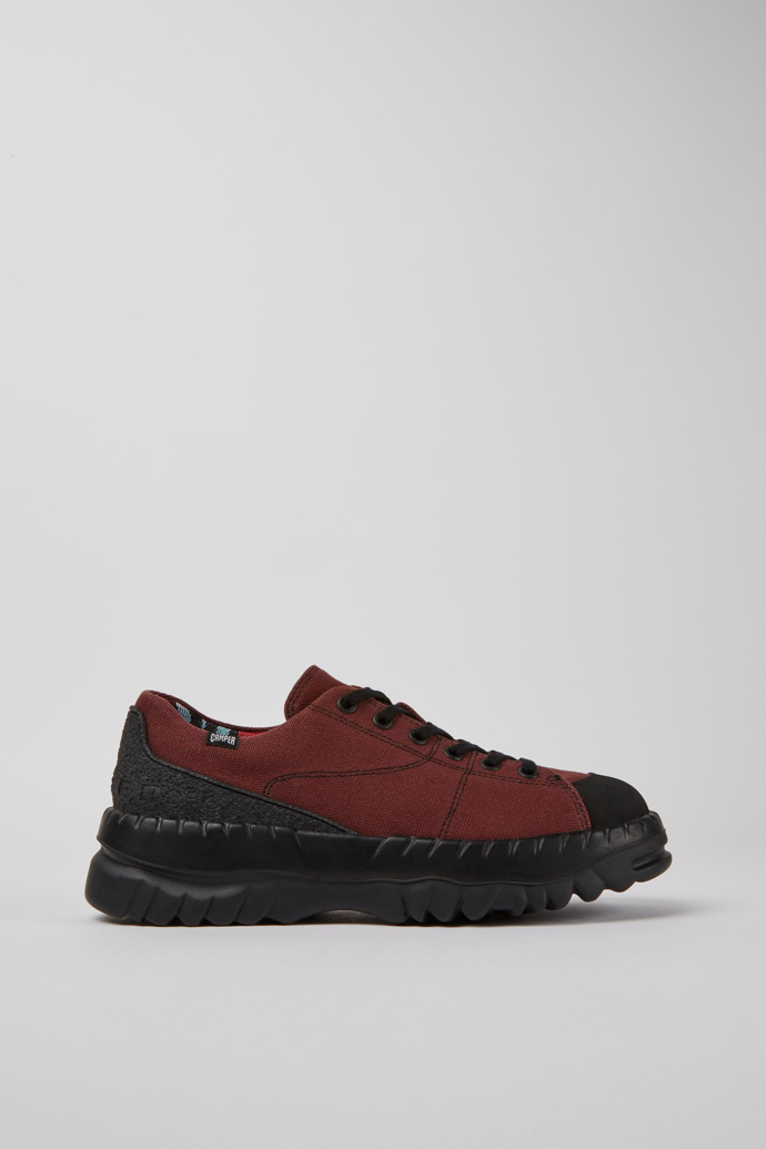 Side view of Teix Burgundy rubber and BCI cotton shoes