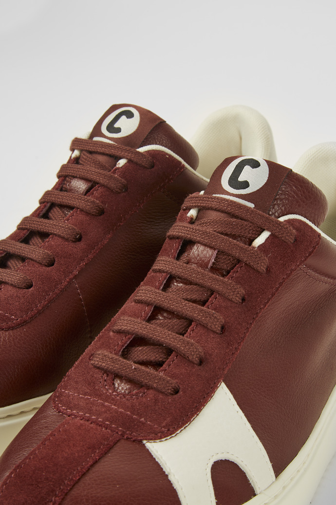 Close-up view of Runner K21 Burgundy sneakers for men