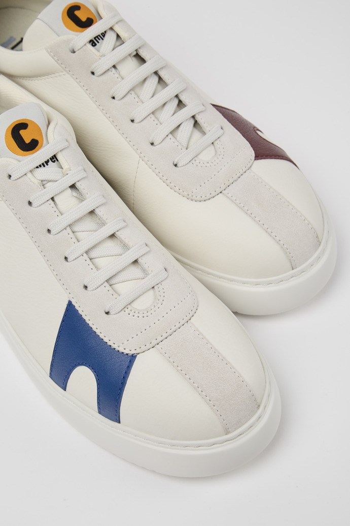 Close-up view of Twins White leather and suede sneakers