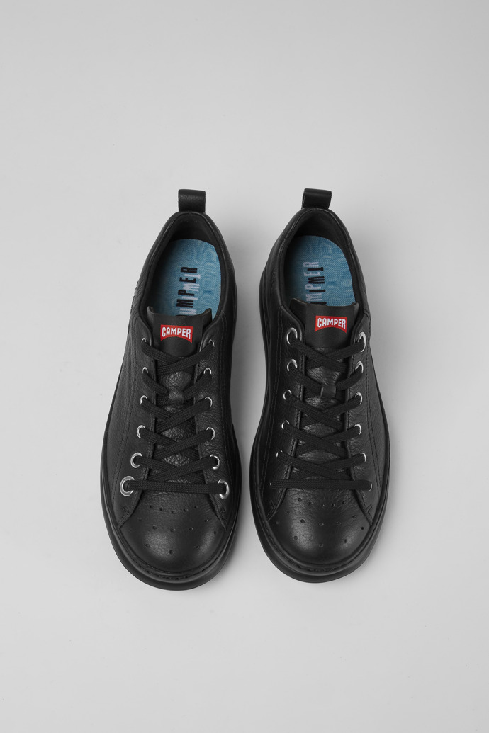 Overhead view of Twins Black leather sneakers