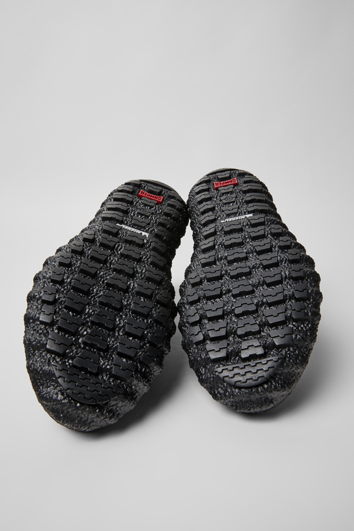 The soles of Ground Black and grey recycled textile shoes