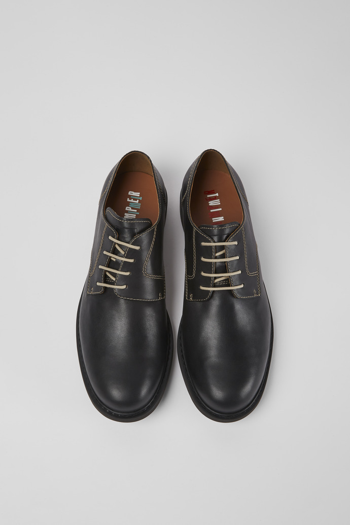 Overhead view of Twins Black leather lace-up shoes