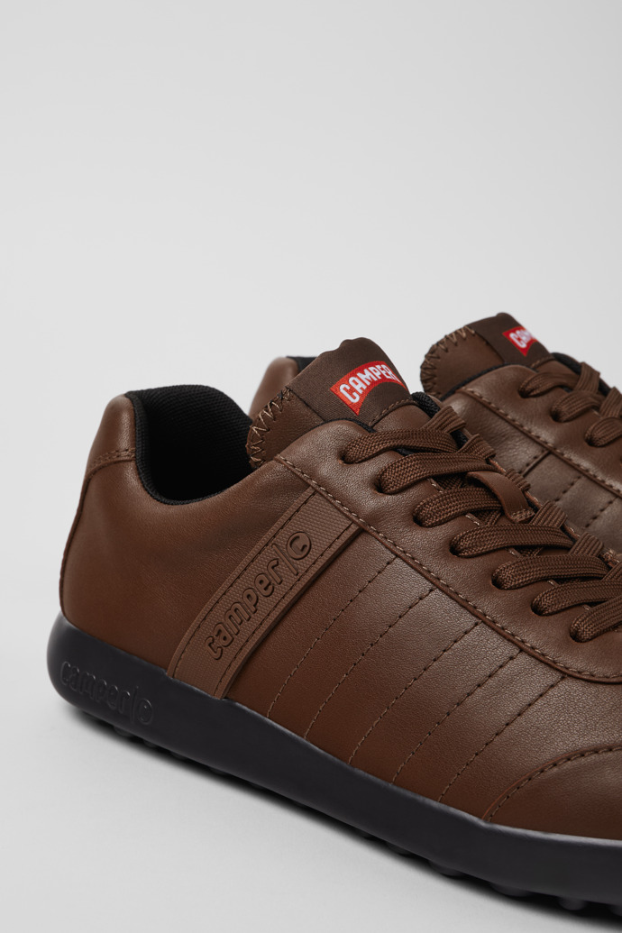 Close-up view of Pelotas XLite Brown leather sneakers for men