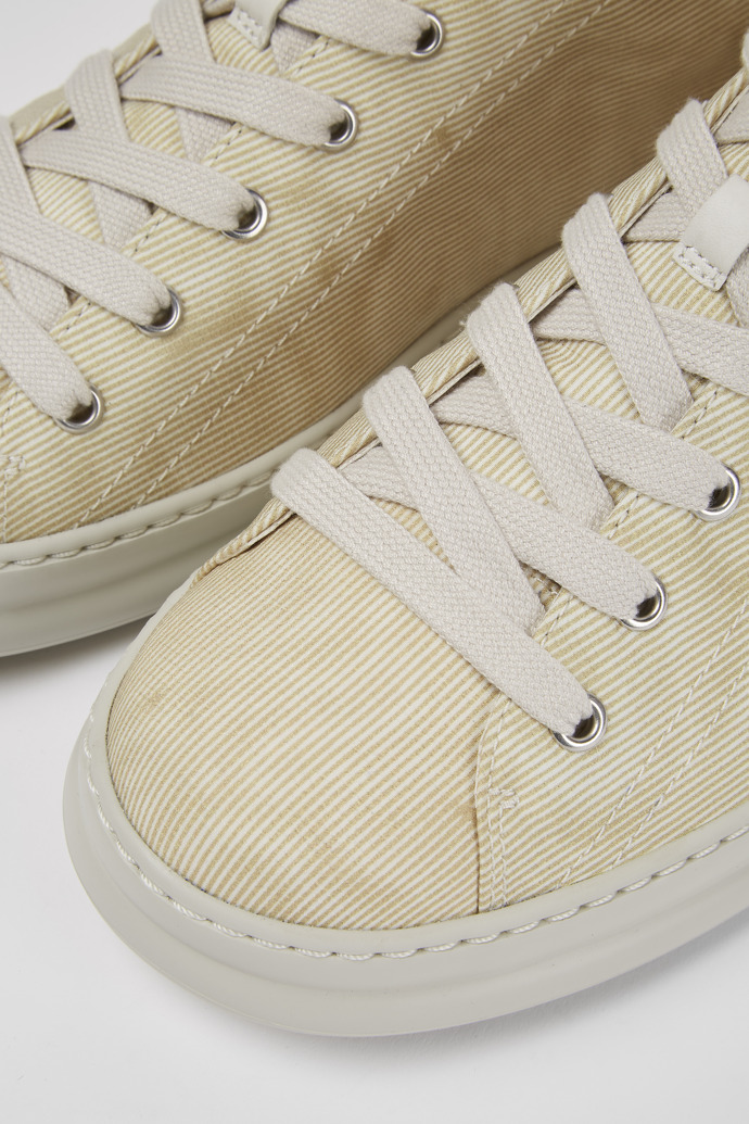 Close-up view of Twins Beige printed sneakers