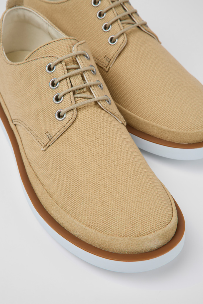 Close-up view of Wagon Beige textile and nubuck shoes for men