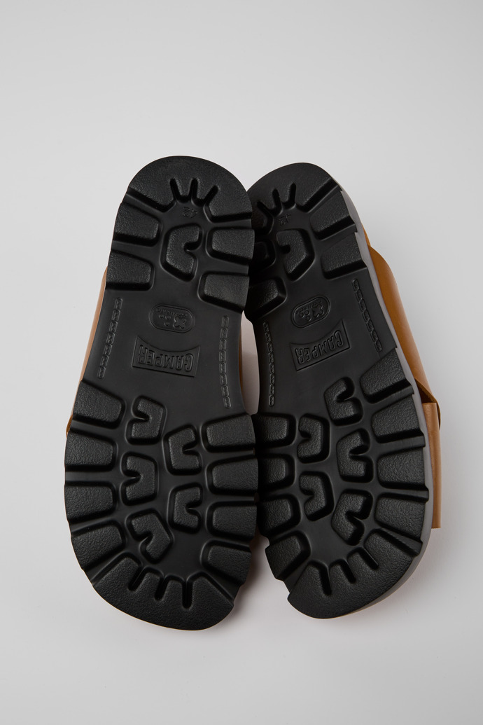 The soles of Brutus Sandal Brown leather sandals for men