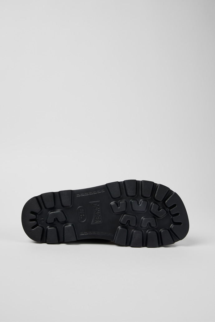 The soles of Brutus Sandal Black Leather 2-Strap Sandal for Men