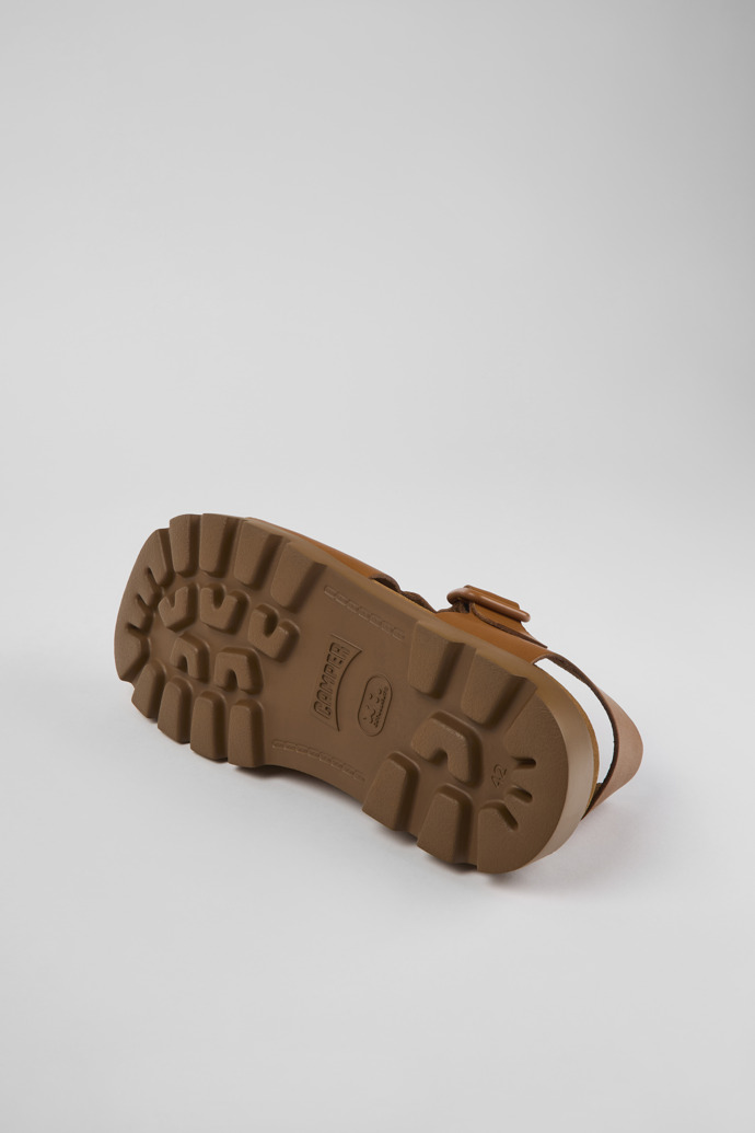 The soles of Brutus Sandal Brown leather sandals for men
