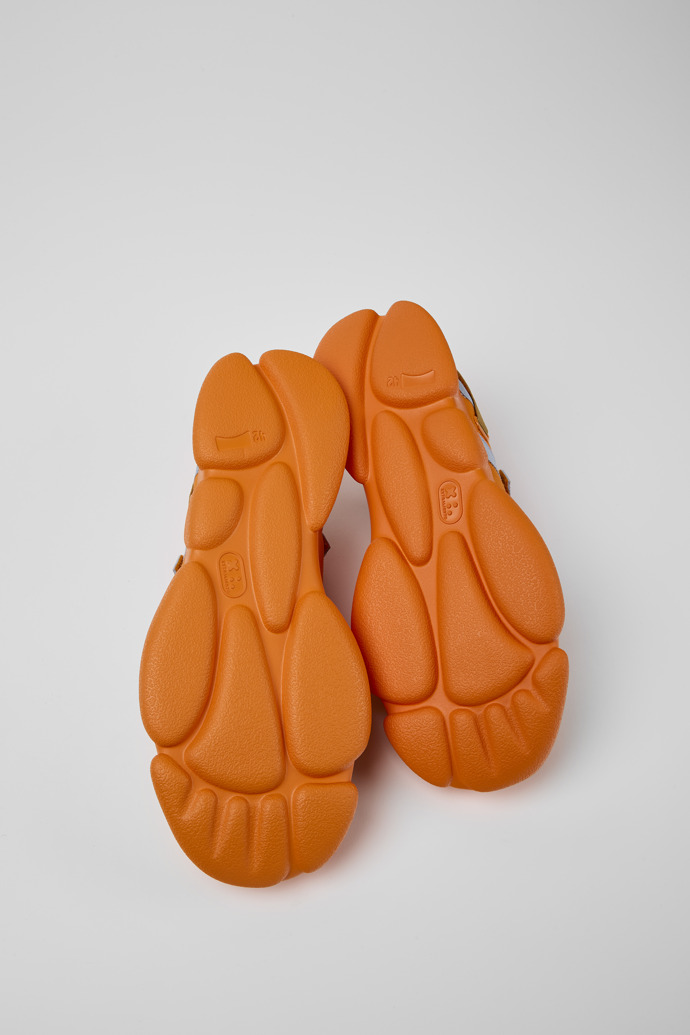 The soles of Karst Orange and brown textile shoes for men