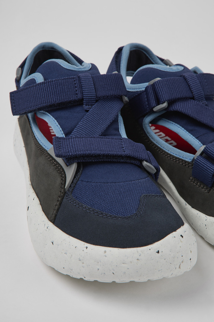 Close-up view of Peu Stadium Blue and gray leather and textile semi-open sneakers for men