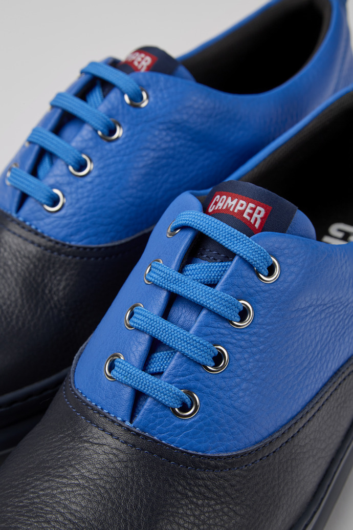 Close-up view of Runner Blue leather sneakers for men