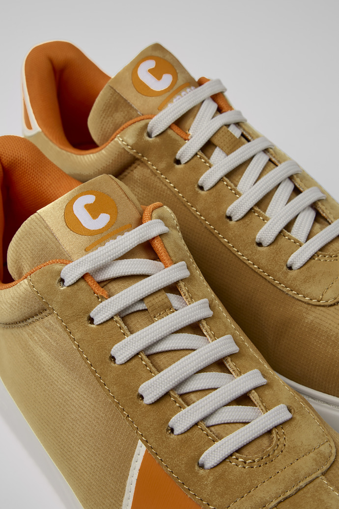 Close-up view of Runner K21 Brown, orange, and beige sneakers for men