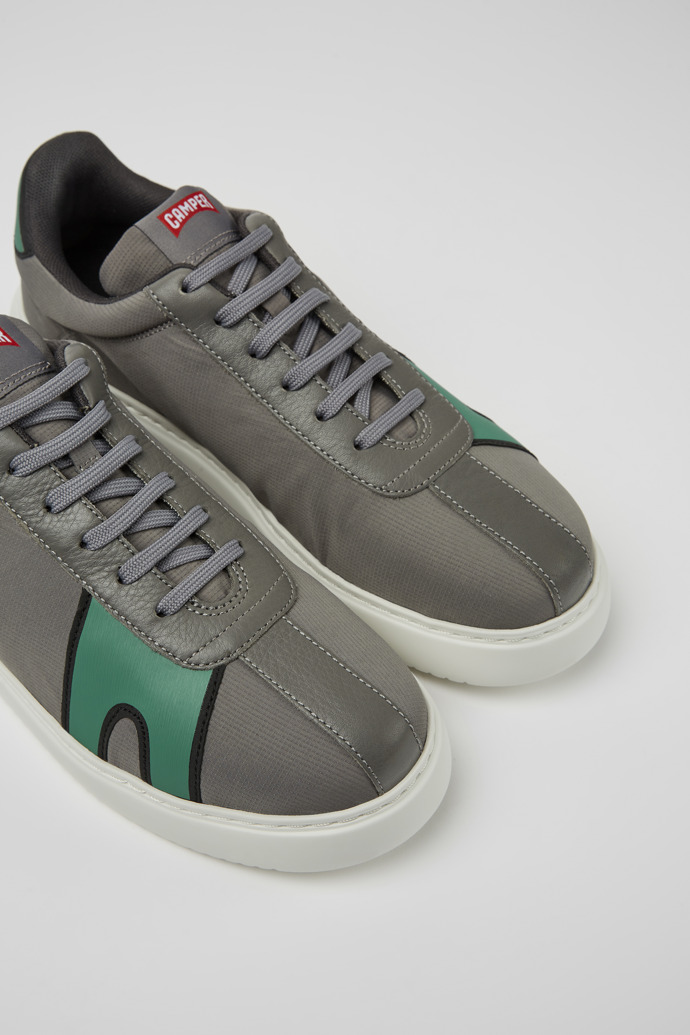 Close-up view of Runner K21 Gray and green sneakers for men