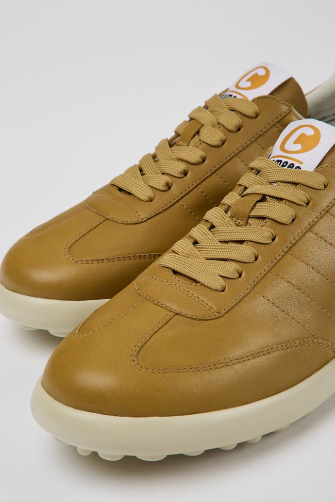 Close-up view of Pelotas XLite Brown and beige leather sneakers for men