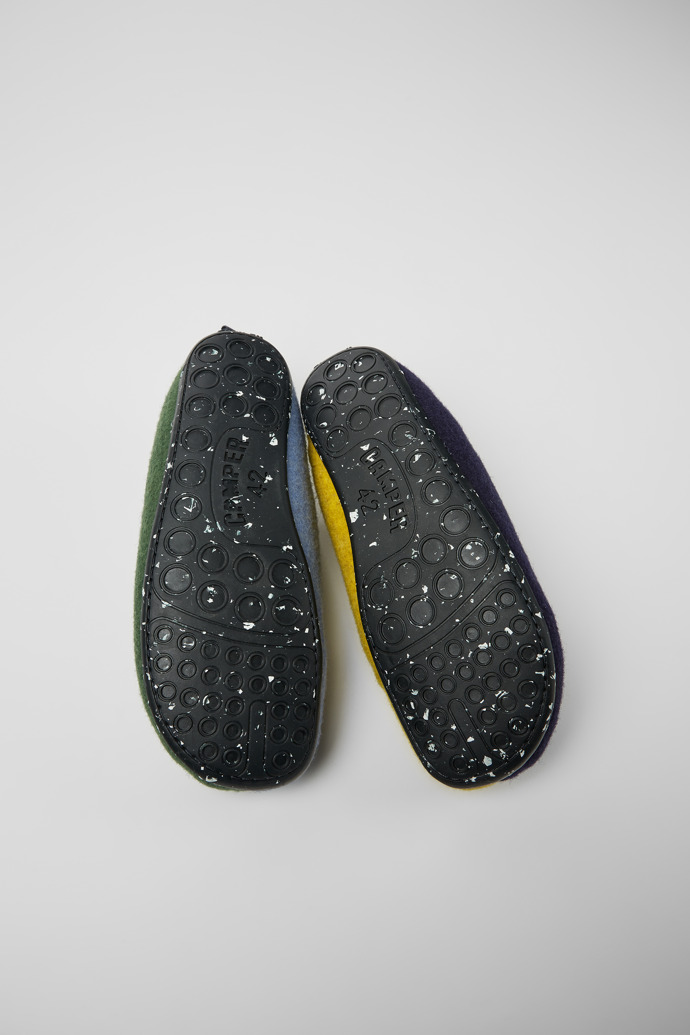 The soles of Twins Green, blue, and gray wool slippers for men