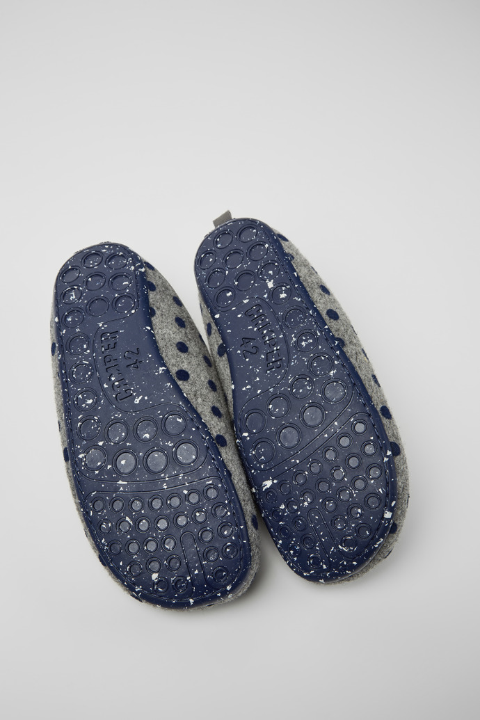 The soles of Wabi Gray and blue wool slippers for men