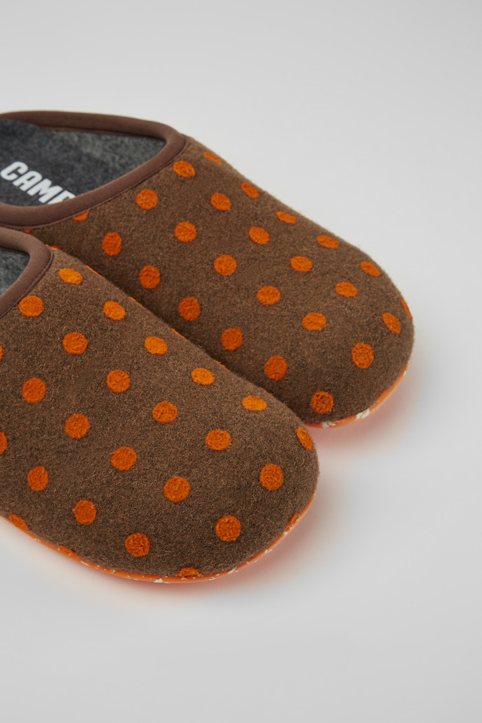 Close-up view of Wabi Brown and orange wool slippers for men