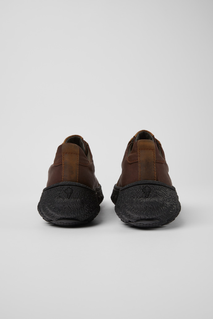 Back view of Ground Brown textile and leather shoes for men