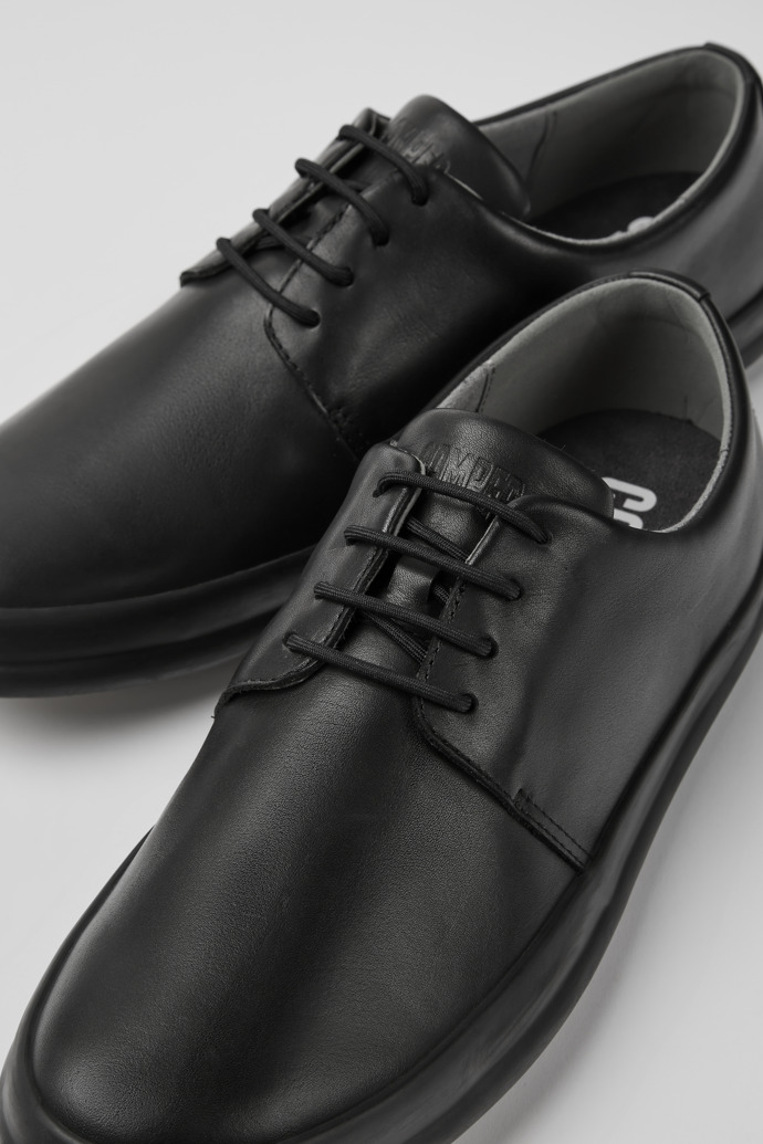 Close-up view of Chasis Black leather shoes for men