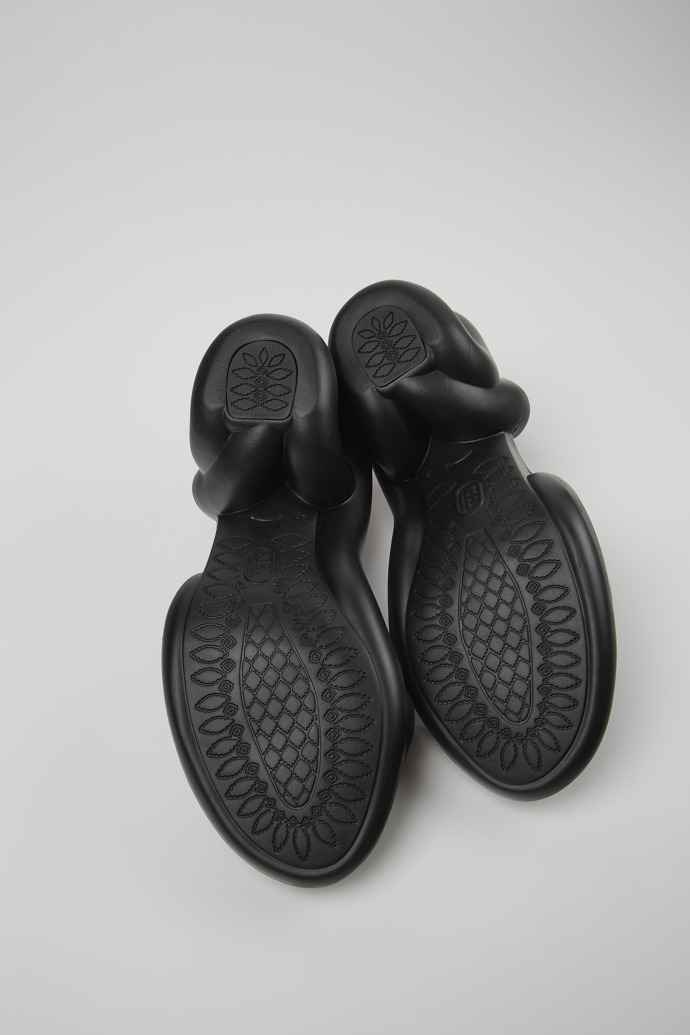 The soles of Kobarah Black unisex sandals