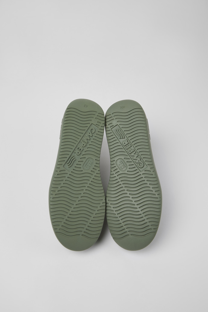 The soles of Runner K21 Green nubuck sneakers for men