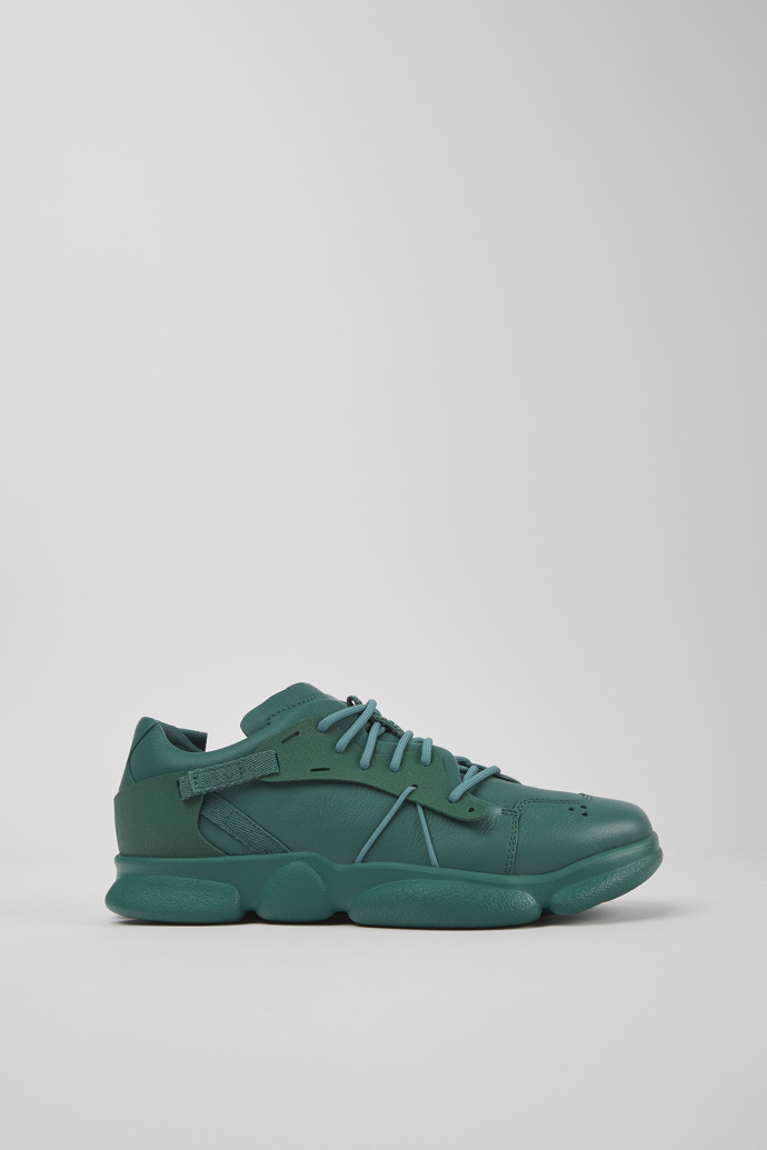 Image of Side view of Karst Green leather and textile sneakers for men
